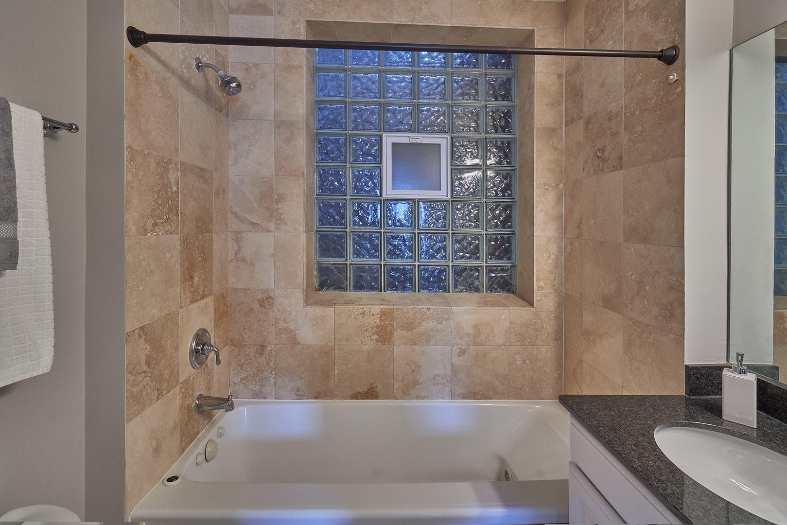 2801 North Seminary Avenue, Unit 1S Chicago, IL 60657 - Photo 13 of 21 a bathroom with a shower curtain and a sink