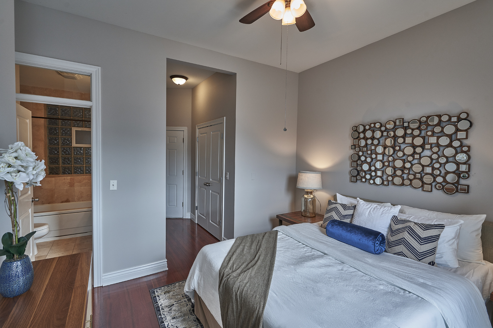 2801 North Seminary Avenue, Unit 1S Chicago, IL 60657 - Photo 15 of 21 a bedroom with a bed and a chandelier