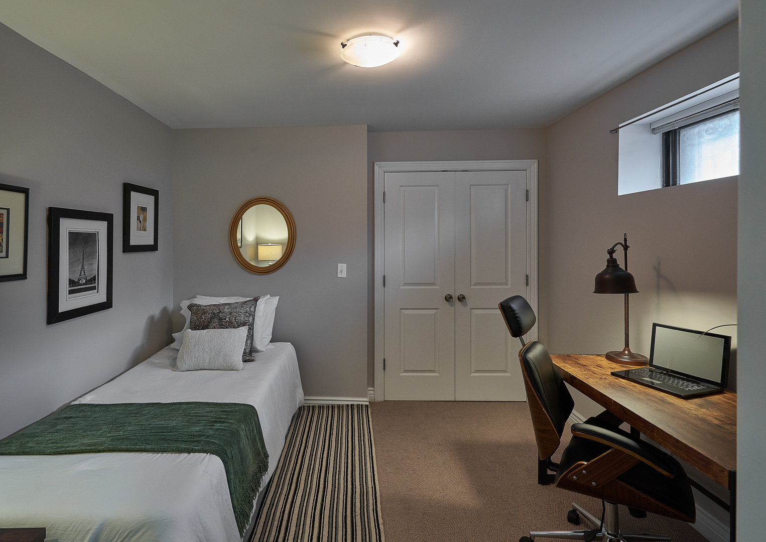 2801 North Seminary Avenue, Unit 1S Chicago, IL 60657 - Photo 16 of 21 a bedroom with a bed and a chandelier