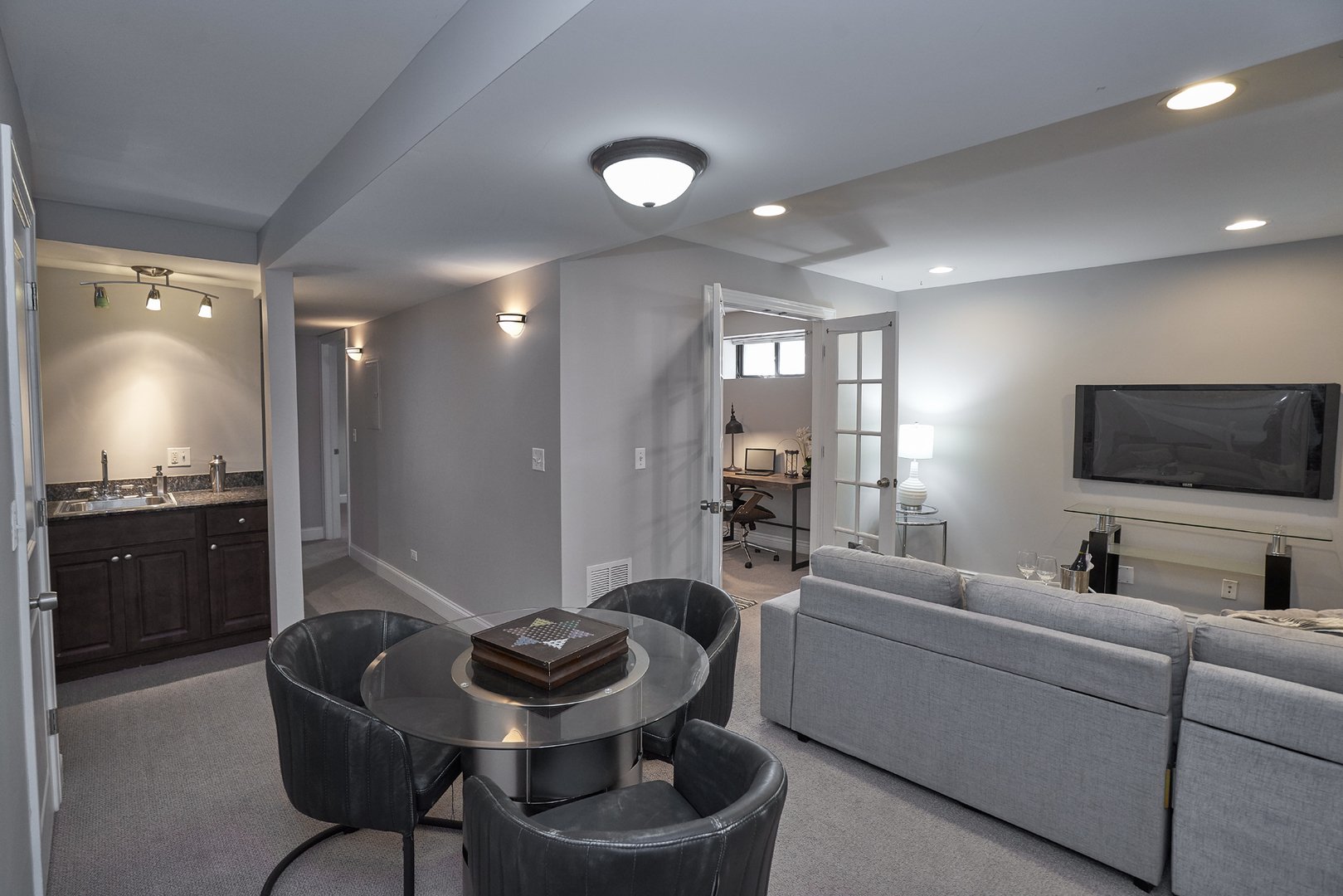 2801 North Seminary Avenue, Unit 1S Chicago, IL 60657 - Photo 17 of 21 a living room with furniture and a flat screen tv