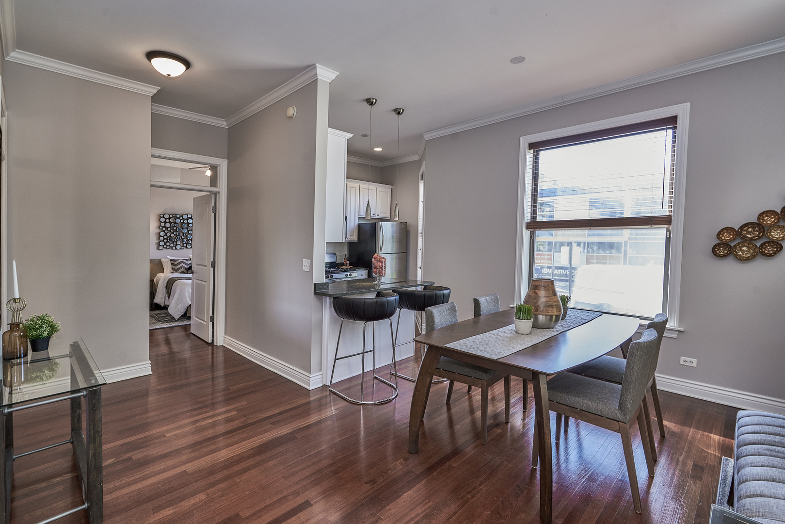 2801 North Seminary Avenue, Unit 1S Chicago, IL 60657 - Photo 5 of 21 a view of a dining room with furniture window and wooden floor