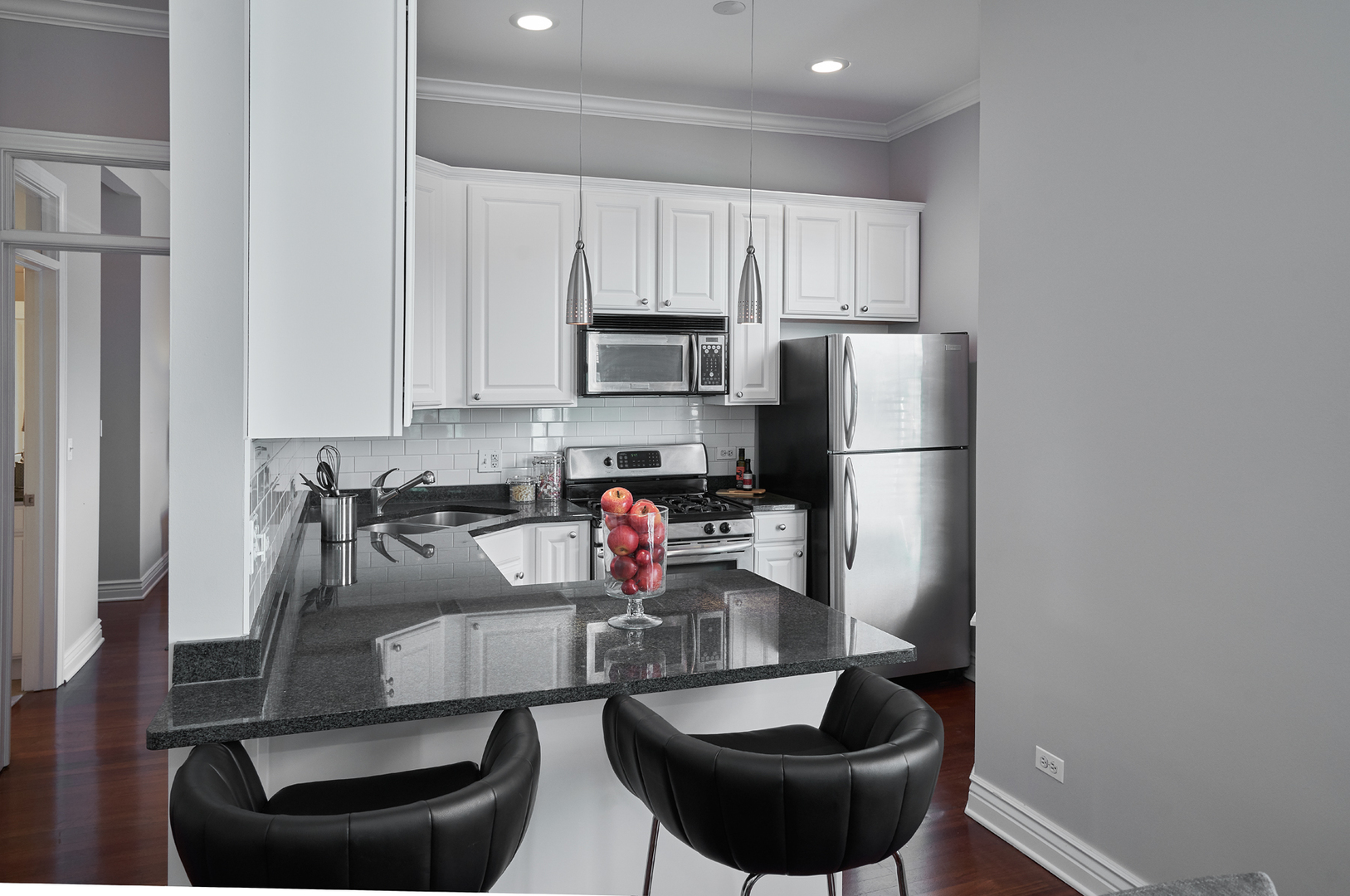 2801 North Seminary Avenue, Unit 1S Chicago, IL 60657 - Photo 7 of 21 a kitchen with a refrigerator and a sink