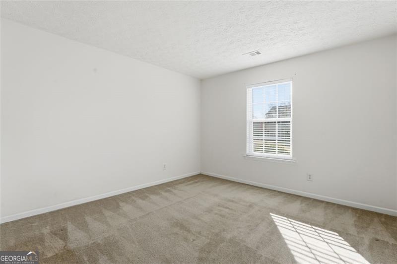 6214 Tree Ridge Dr N West Acworth, GA 30101 - Photo 25 of 41 an empty room with a window