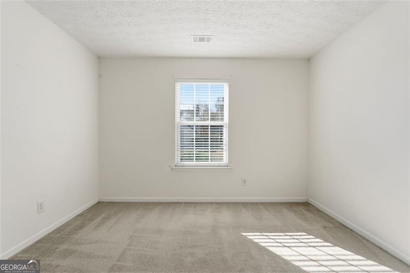 6214 Tree Ridge Dr N West Acworth, GA 30101 - Photo 26 of 41 an empty room with a window