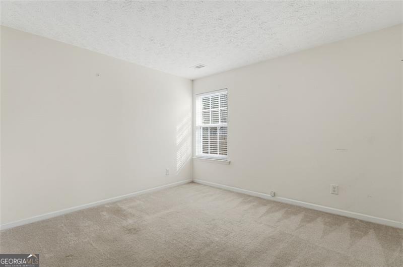 6214 Tree Ridge Dr N West Acworth, GA 30101 - Photo 28 of 41 an empty room with windows