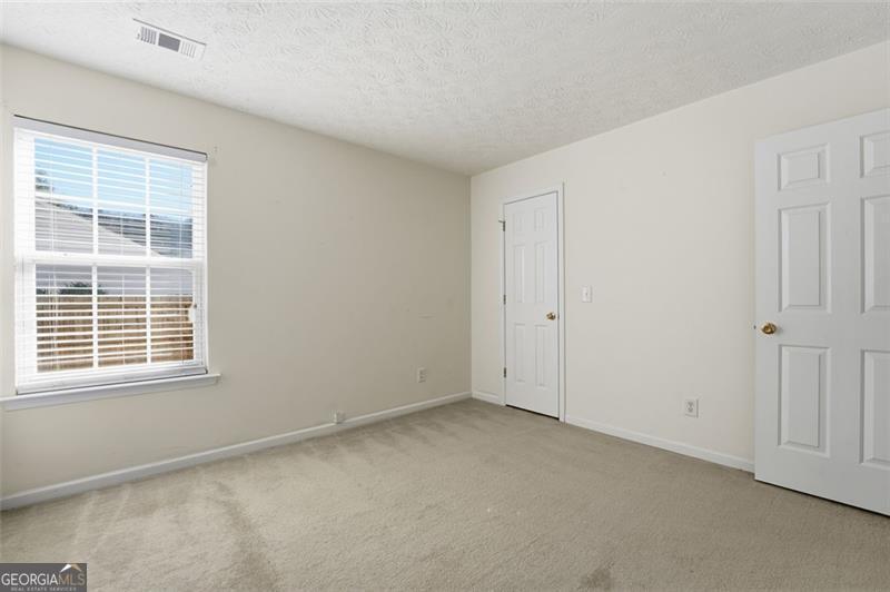 6214 Tree Ridge Dr N West Acworth, GA 30101 - Photo 29 of 41 a view of an empty room with a window