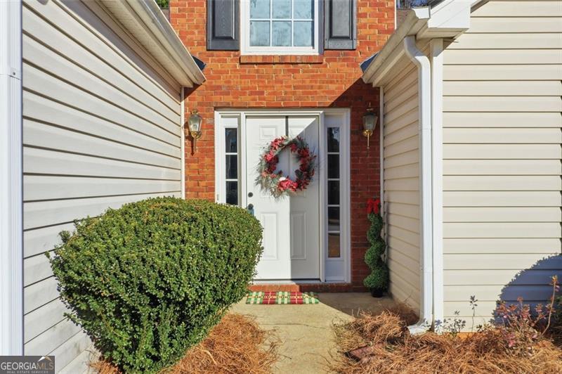 6214 Tree Ridge Dr N West Acworth, GA 30101 - Photo 3 of 41 a front view of a house with garden