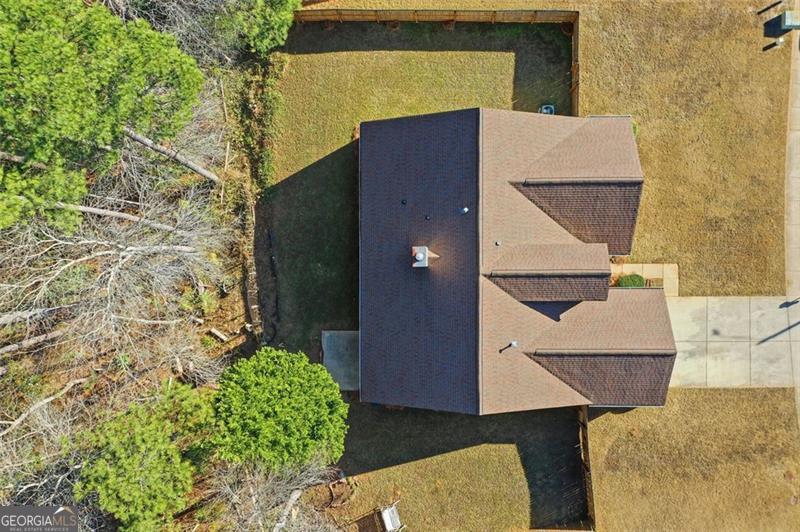 6214 Tree Ridge Dr N West Acworth, GA 30101 - Photo 4 of 41 aerial view of a house with a yard