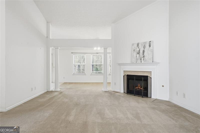 6214 Tree Ridge Dr N West Acworth, GA 30101 - Photo 10 of 41 a view of an empty room with a fireplace