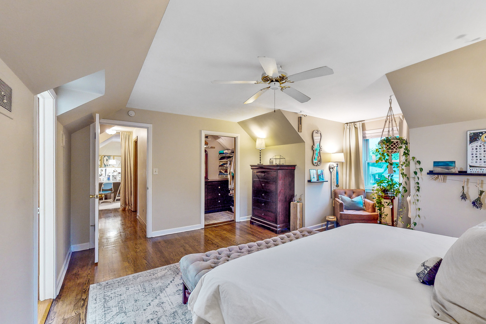 823 South Western Avenue Park Ridge, IL 60068 - Photo 15 of 39 a bedroom with a bed chandelier and a window
