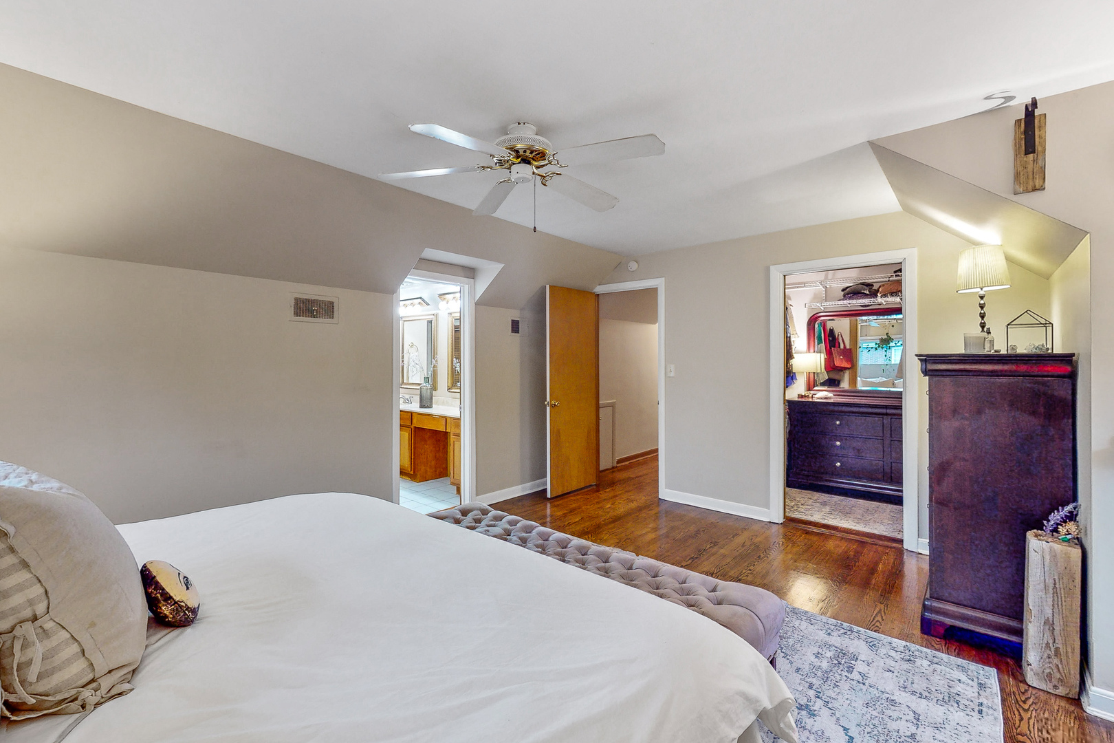 823 South Western Avenue Park Ridge, IL 60068 - Photo 16 of 39 a bedroom with a bed and a chandelier