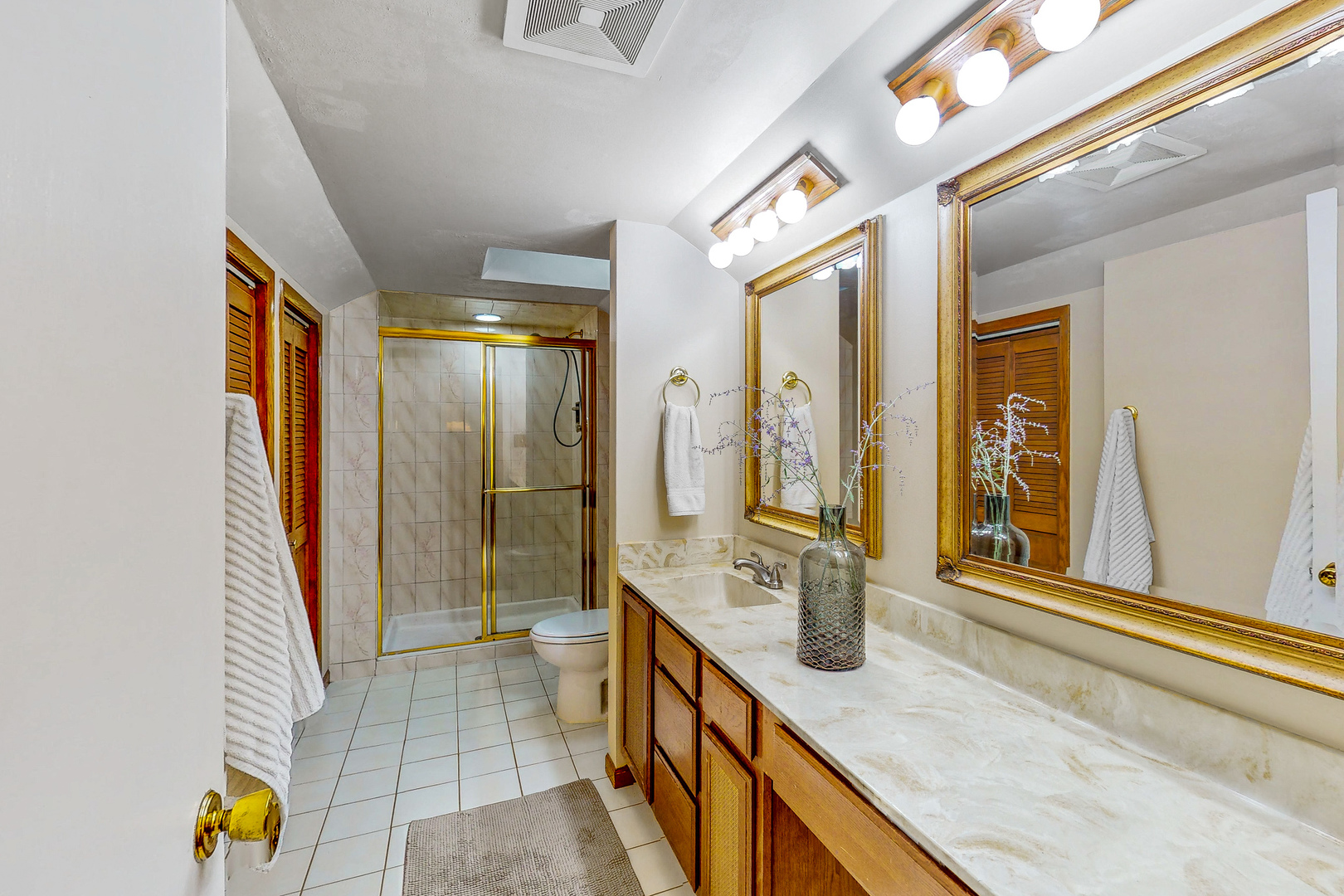 823 South Western Avenue Park Ridge, IL 60068 - Photo 17 of 39 a bathroom with a granite countertop sink and a shower