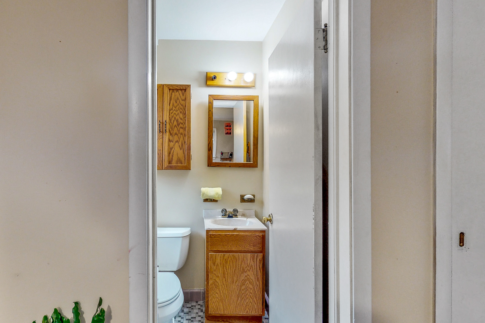 823 South Western Avenue Park Ridge, IL 60068 - Photo 23 of 39 a bathroom with a sink and a mirror