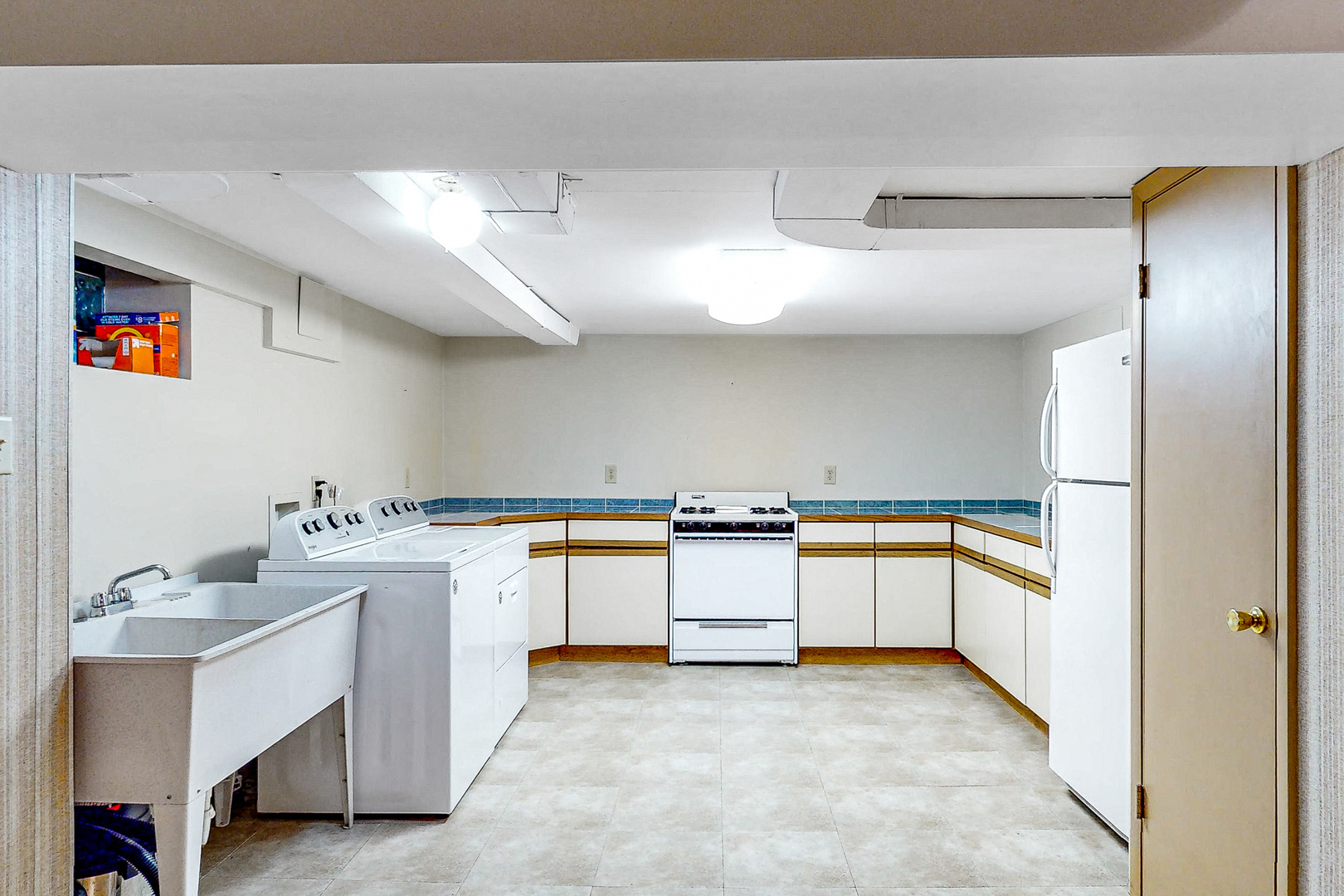823 South Western Avenue Park Ridge, IL 60068 - Photo 30 of 39 a kitchen with stainless steel appliances a sink and a refrigerator