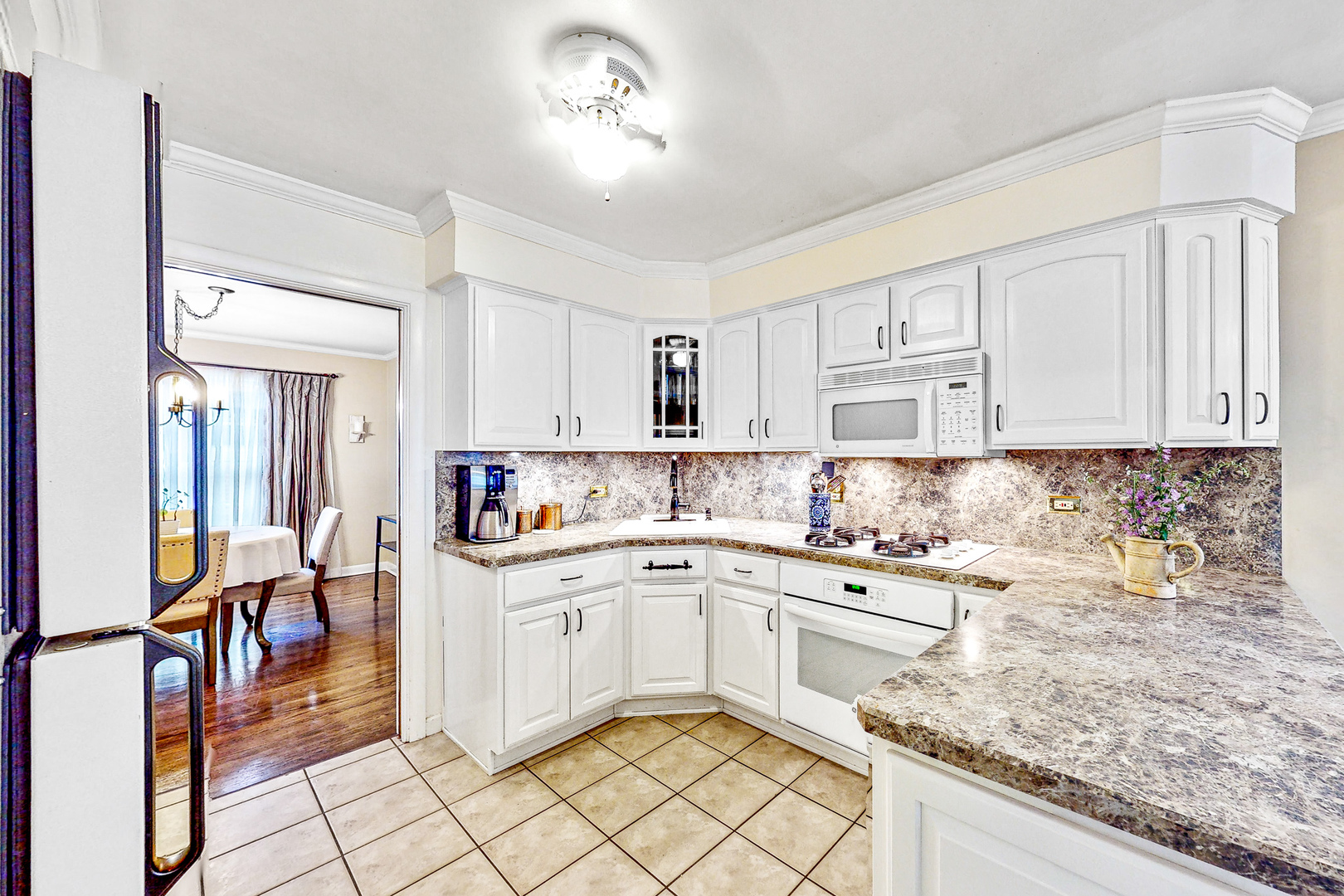 823 South Western Avenue Park Ridge, IL 60068 - Photo 9 of 39 a kitchen with a sink cabinets and window