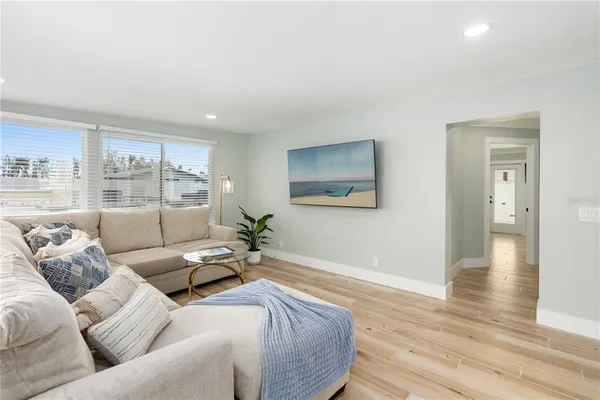 a bedroom with a bed and a table