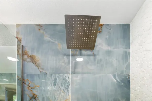 a bedroom with a bed and a table in it