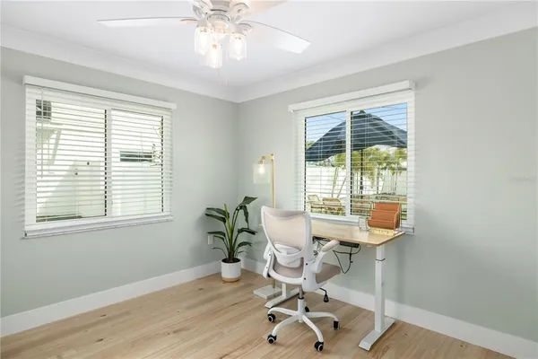 a living room with furniture and a walk in closet