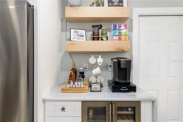 a view of living room with furniture and flat screen tv