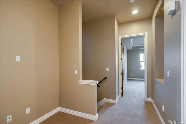 a view of a hallway with elevator