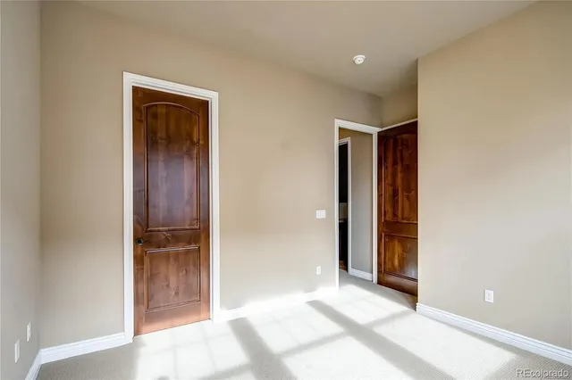 a large bathroom with a tub sink shower and mirror