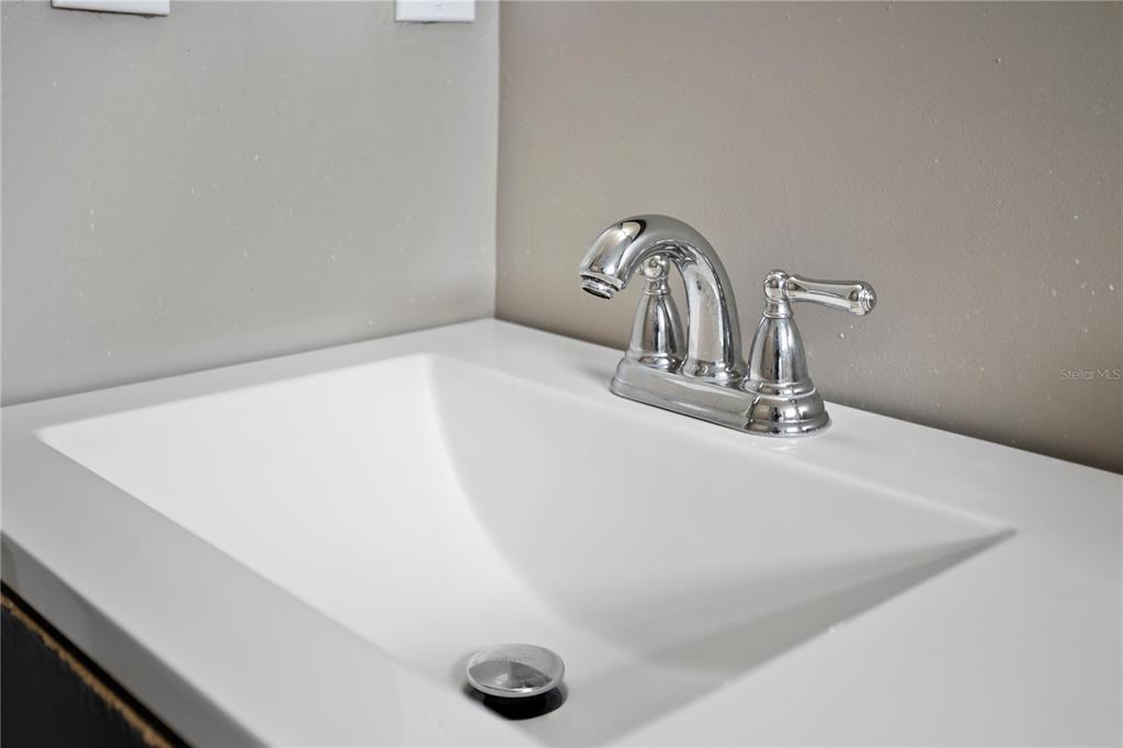 2749 North Poinciana Boulevard, Unit 15 Kissimmee, FL 34746 - Photo 18 of 36 a close view of sink