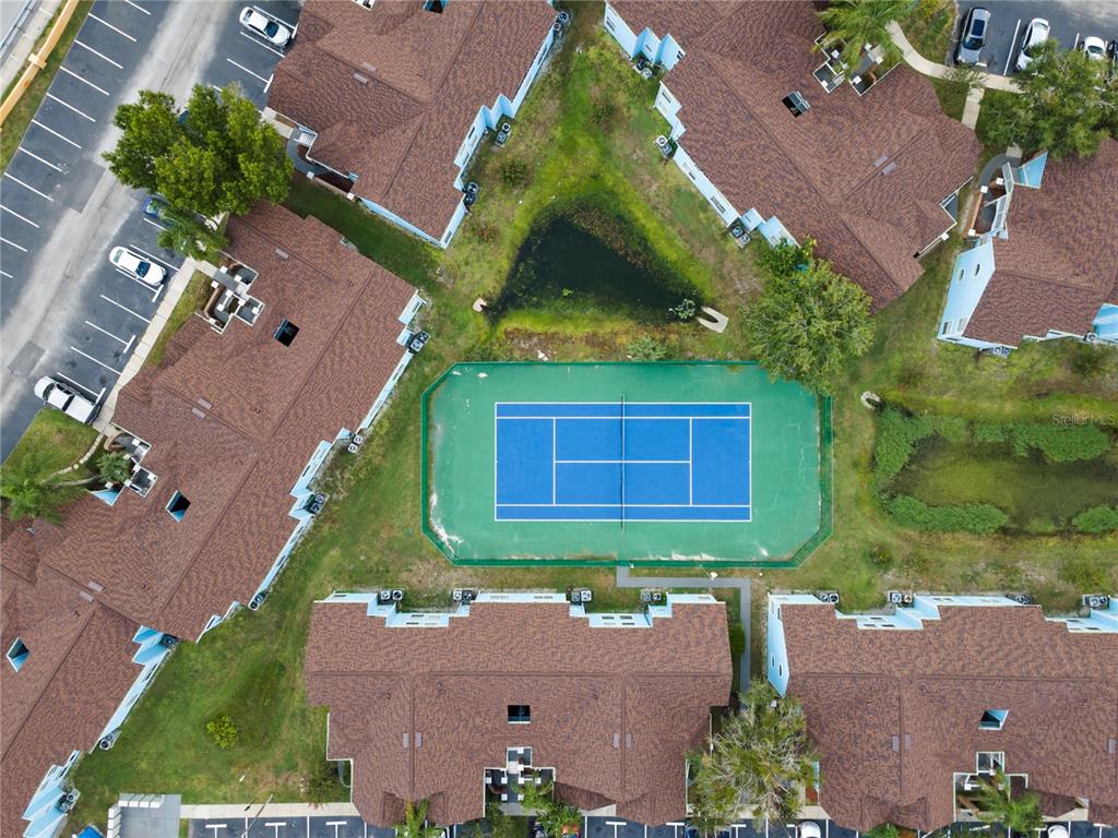 2749 North Poinciana Boulevard, Unit 15 Kissimmee, FL 34746 - Photo 30 of 36 an aerial view of a house