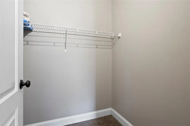 a view of small space with racks on the wall