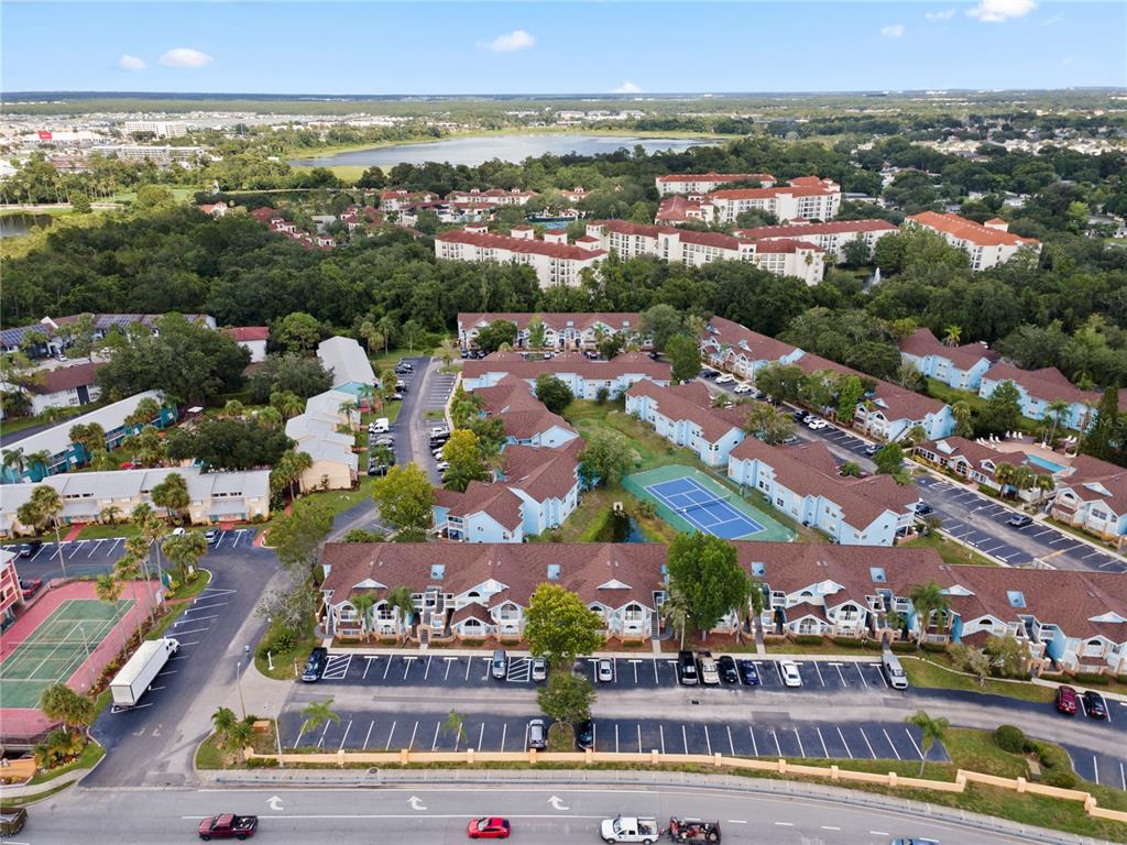 2749 North Poinciana Boulevard, Unit 15 Kissimmee, FL 34746 - Photo 33 of 36 an aerial view of a city
