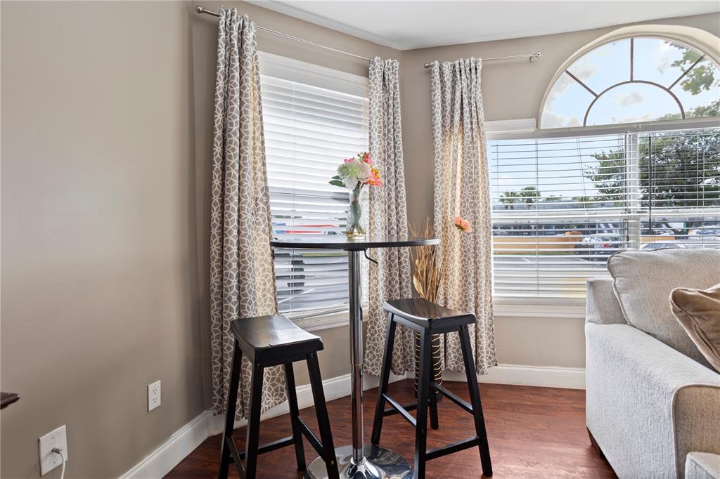 2749 North Poinciana Boulevard, Unit 15 Kissimmee, FL 34746 - Photo 7 of 36 a view of a hallway with furniture and window