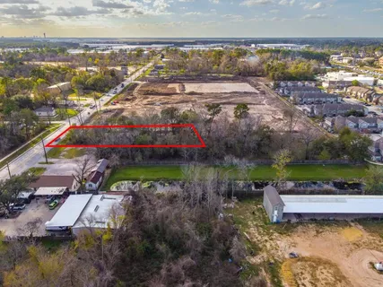 a view of a bench in front of main door