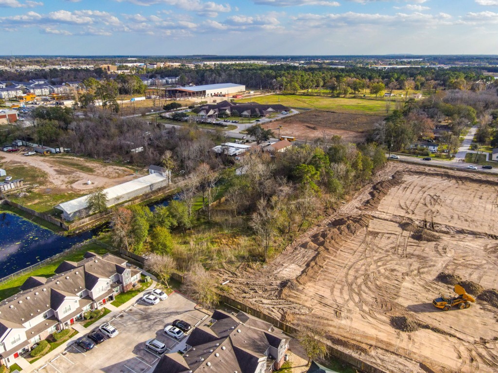 9111 Humble Westfield Road Humble, TX 77338 - Photo 7 of 9 a view of a city with an ocean view