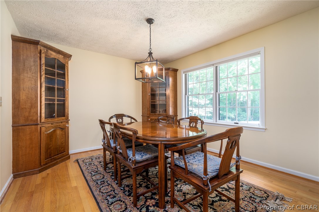 279 Peake Road Weems, VA 22576 - Photo 28 of 49 Dining Room with Corner Cabinets