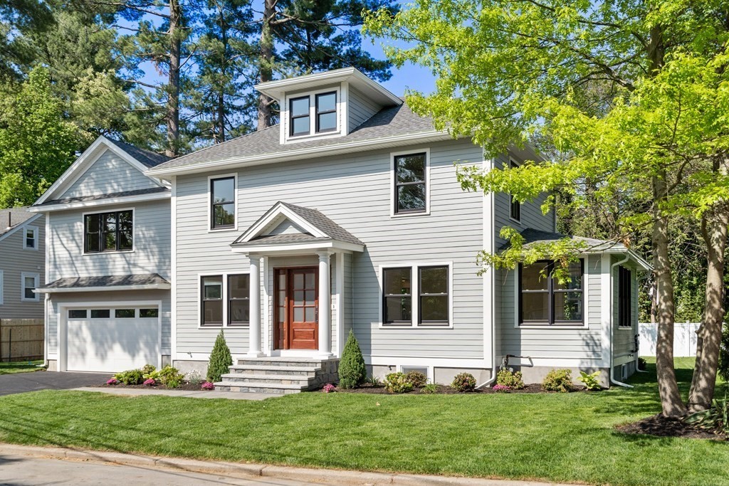 30 Asheville Road Newton, MA 02462 - Photo 1 of 16 a front view of a house with a yard