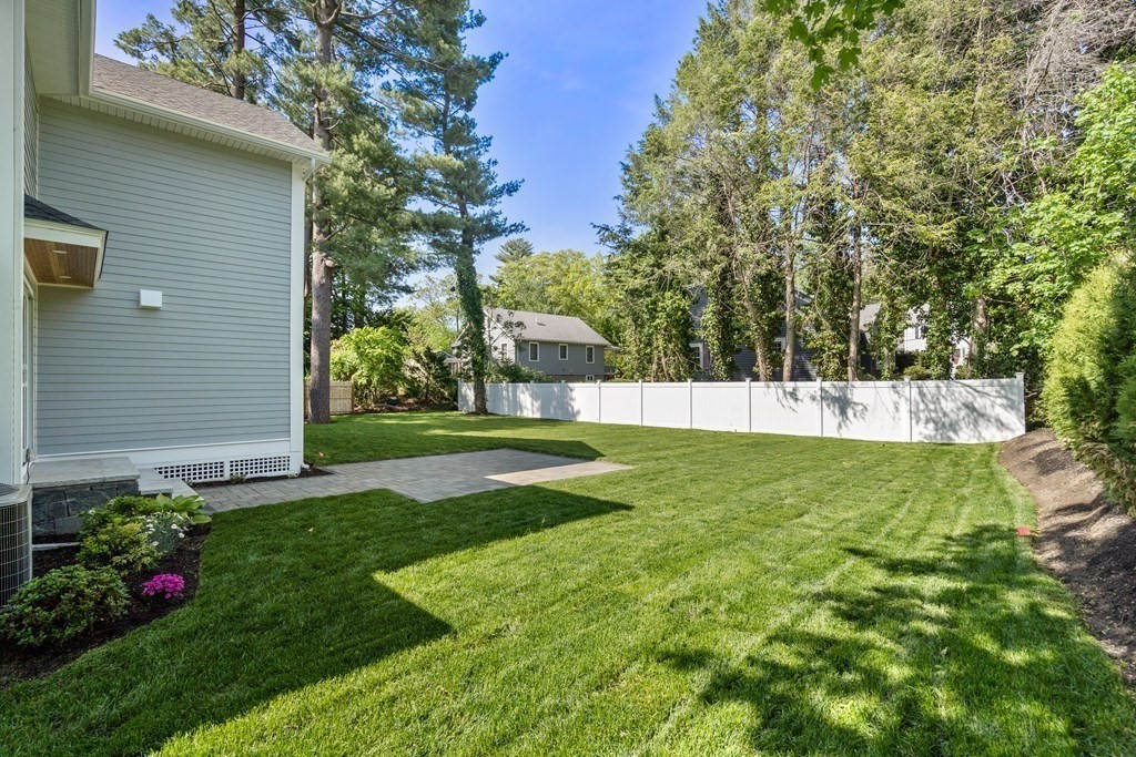 30 Asheville Road Newton, MA 02462 - Photo 15 of 16 a view of a house with a backyard