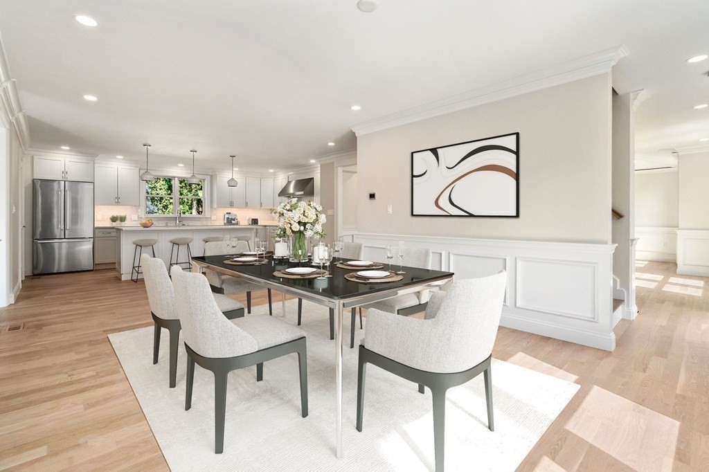 30 Asheville Road Newton, MA 02462 - Photo 3 of 16 a view of a dining room with furniture and wooden floor