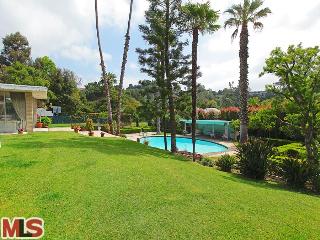 a view of a park with a slide