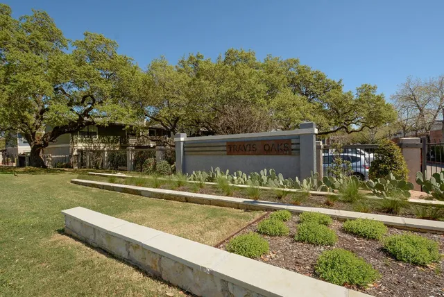 a swimming pool view with a outdoor seating
