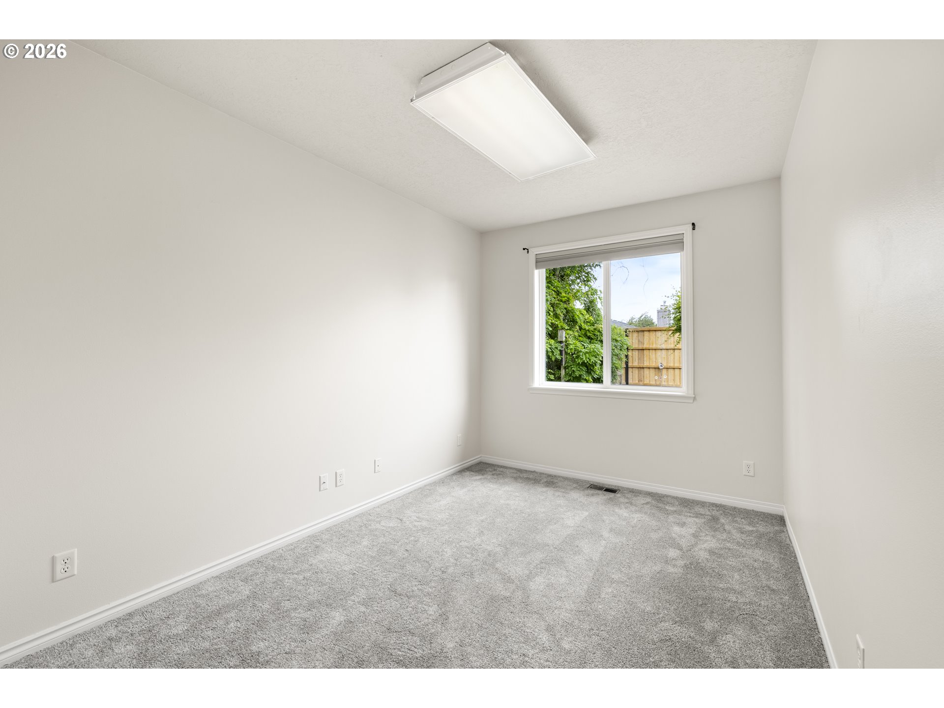 535 Maple Street Mount Angel, OR 97362 - Photo 17 of 48 an empty room with windows