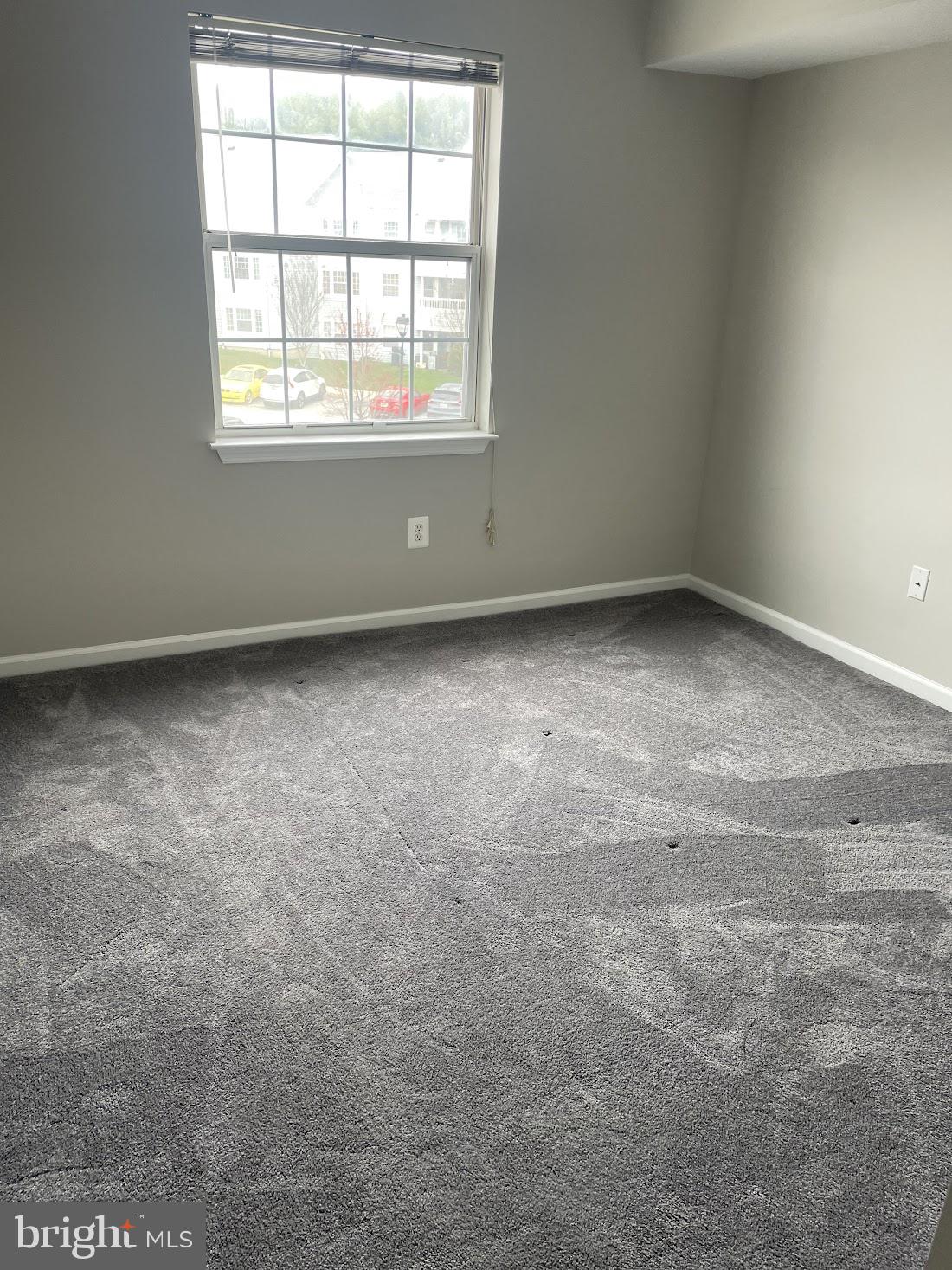 8343 Montgomery Run Road Ellicott City, MD 21043 - Photo 33 of 36 Bright and airy room with fresh carpet.