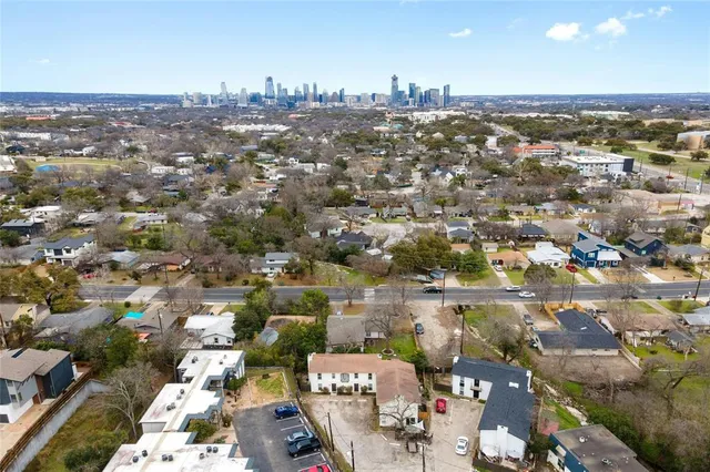 an aerial view of a city with lots of residential buildings
