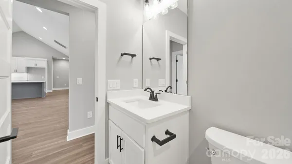 a view of cabinets and wooden floor