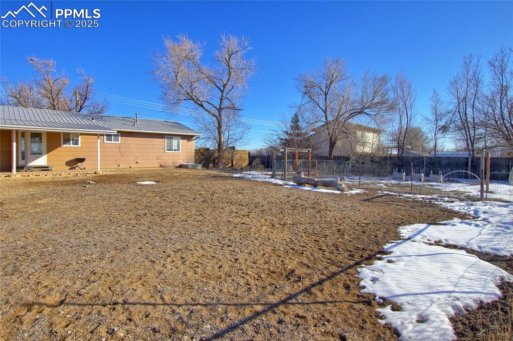 369 G Street Penrose, CO 81240 - Photo 26 of 37 a view of a parking space in front of a house