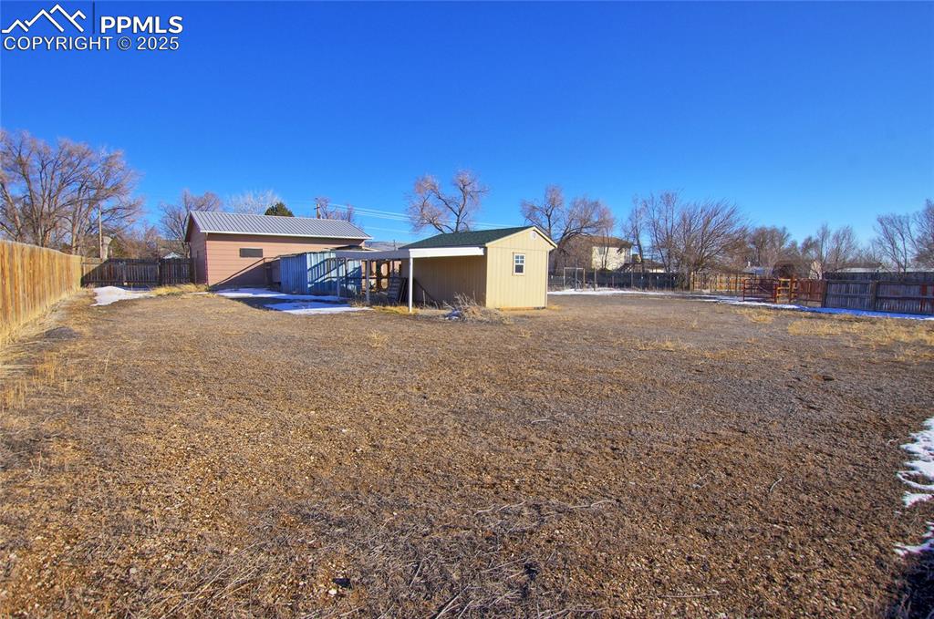 369 G Street Penrose, CO 81240 - Photo 33 of 37 a view of a house with a yard