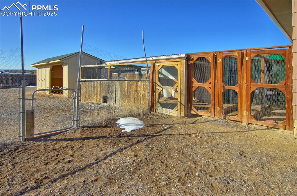 369 G Street Penrose, CO 81240 - Photo 36 of 37 a bathroom with a granite countertop sink and a blue umbrella