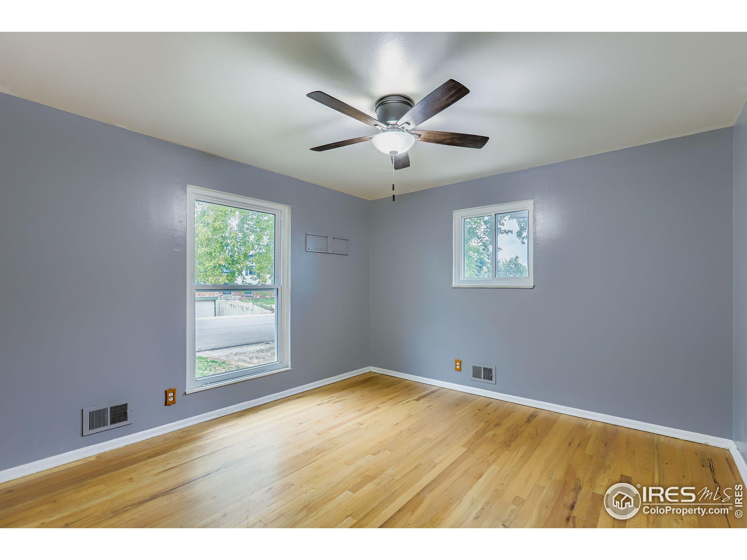 11816 Spring Drive Northglenn, CO 80233 - Photo 6 of 10 a view of an empty room with a window