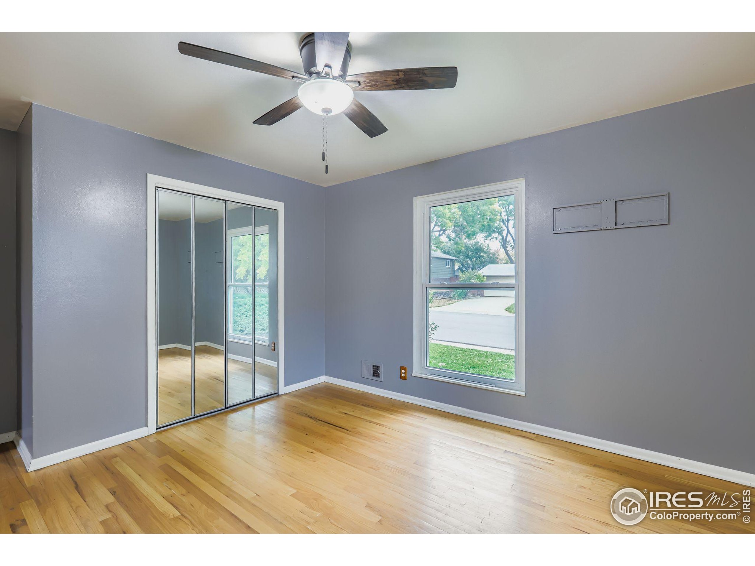11816 Spring Drive Northglenn, CO 80233 - Photo 7 of 10 a view of an empty room with a window