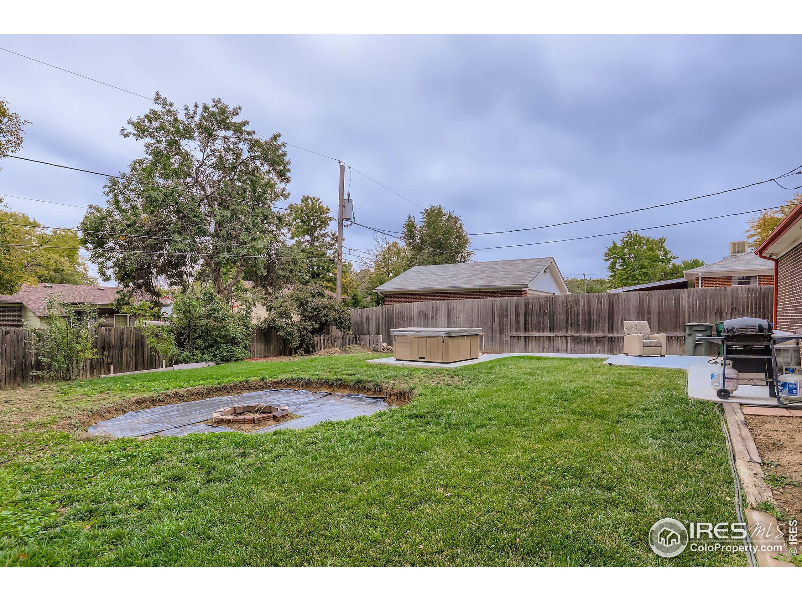 11816 Spring Drive Northglenn, CO 80233 - Photo 9 of 10 a childrens park with lots of swings and slides