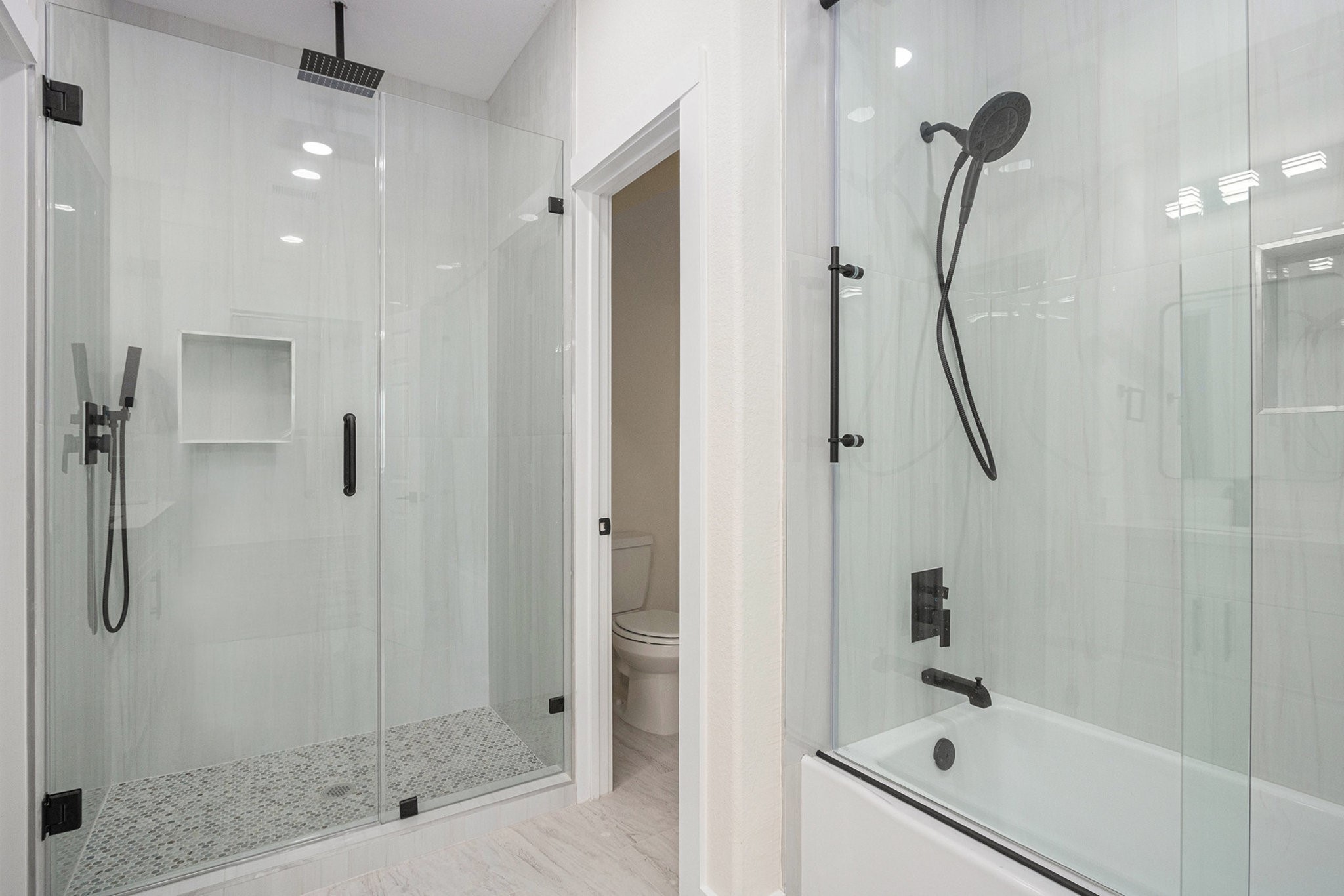 9807 Bamboo Road, Unit A Houston, TX 77041 - Photo 30 of 37 a bathroom with a shower