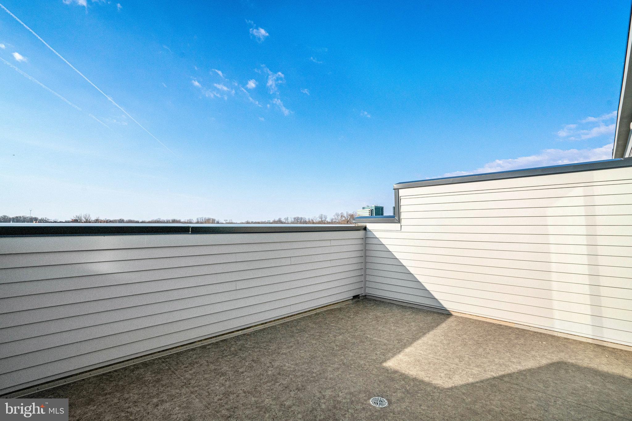 2058 Tysons Ridgeline Road Falls Church, VA 22043 - Photo 37 of 48 a view of a terrace with sky view